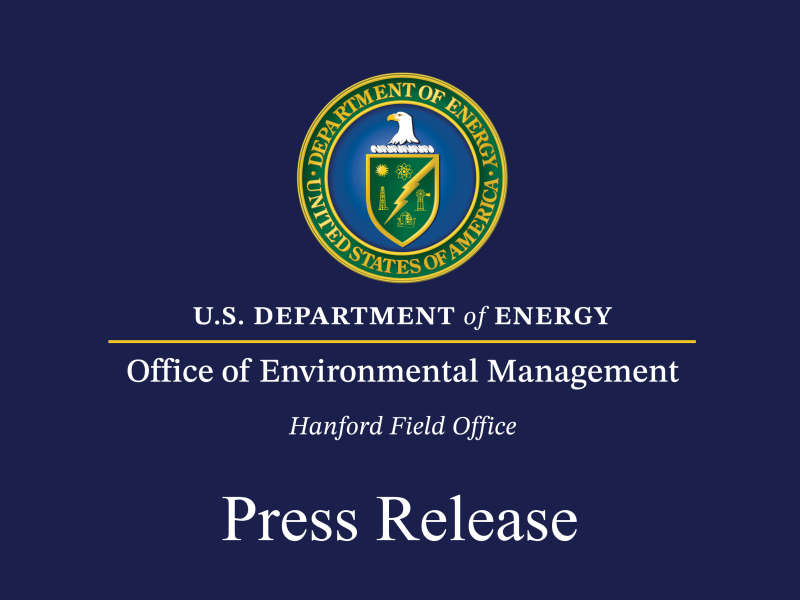 DOE EM logo with Hanford suboffice and Press Release on Navy Background