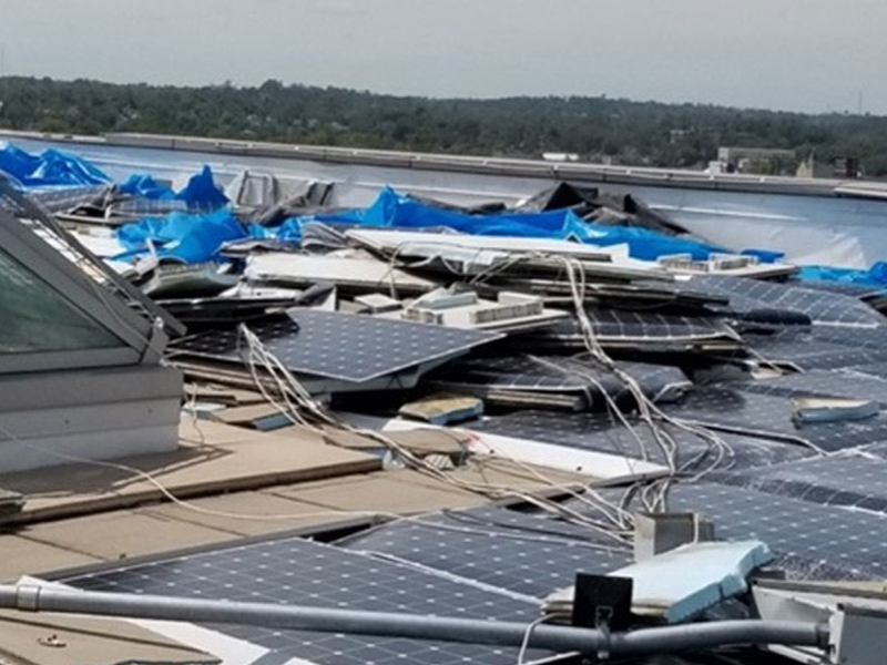 Several solar panels broken due to storm damage.