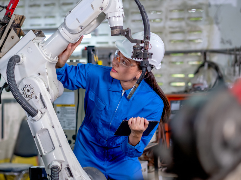 Technician inspects mechanical equipment