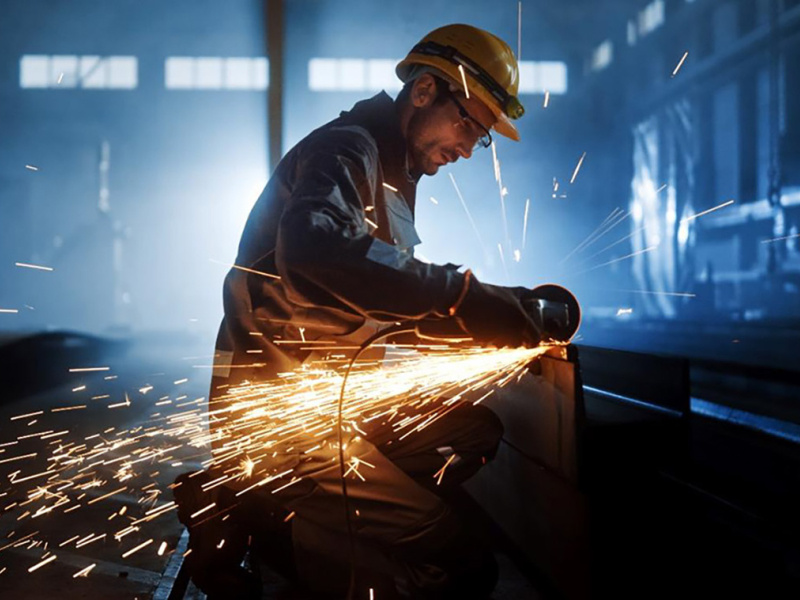 Steel worker in industrial setting