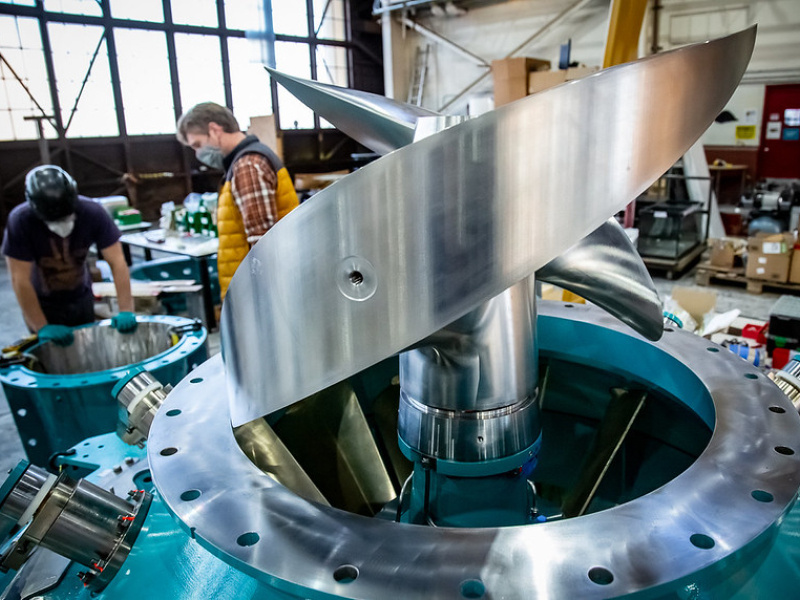 A uniquely thick and forward-swept turbine runner blade awaits the addition of the runner housing at Natel Energy's headquarters in Alameda, California.
