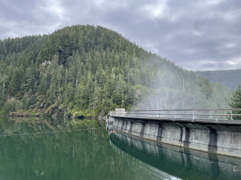 A hydropower facility in front of a mountain
