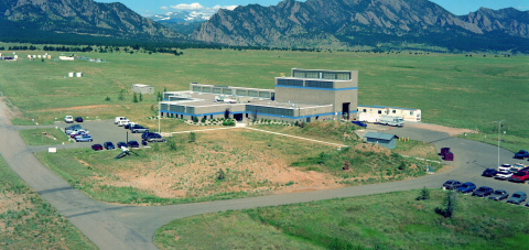 Aerial view of the the National Wind Technology Center, with the Rocky Mountains in the background.