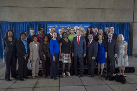 Charter employees of 40 years or more pose for a picture with Secretary Perry and Deputy Secretary Brouilette