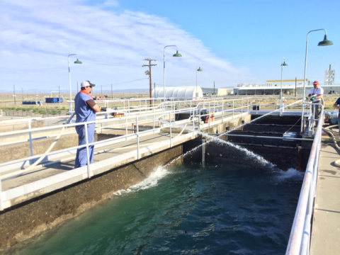 MSA operators Chris Morris and Matt Goble clean the facility’s flocculation basin, where particles are separated from water.