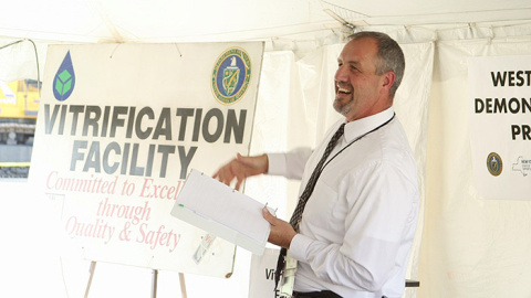 WVDP Director Bryan Bower addresses the audience at a recent celebration marking the start of the Vitrification Facility demolition.
