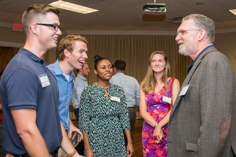 SRNS President and CEO Stuart MacVean (far right) chats with interns (left to right) Benjamin Langdale, Logan Stringfield, Serenity Edwards and Jacqueline Phillips at an intern reception in July 2017.