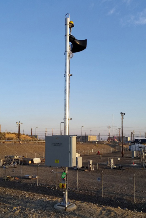 A view of a speaker system installed at Hanford tanks farms to improve communication. This speaker is set up near AW Farm, which contains six large underground waste storage tanks.