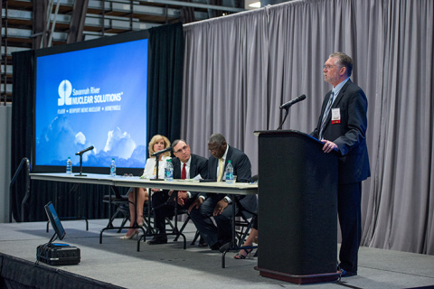 Savannah River Nuclear Solutions President and CEO Stuart MacVean (right) addresses the Federal Business Opportunities Forum audience as part of a panel session.