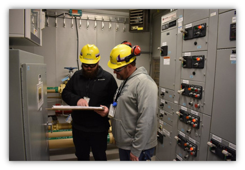 Hanford Waste Treatment and Immobilization Plant workers review procedures as they prepare for the transfer of the Non-radioactive Liquid Waste Disposal System building to commissioning.