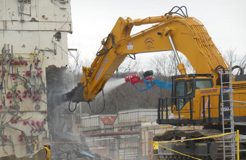 Crews take the “first bite” of the Vitrification Facility during the second phase of demolition.
