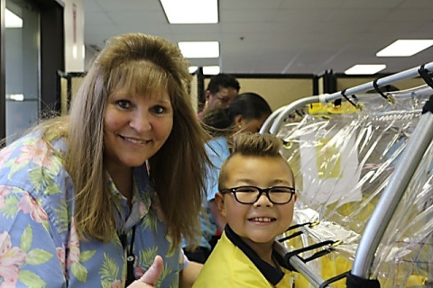 Next generation radiation protection specialists learn about contamination and proper “dress-out” techniques before working with a glovebox.