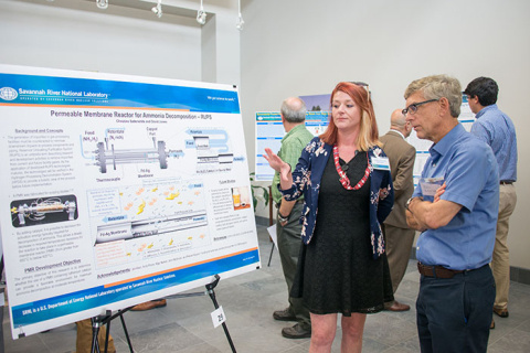 Christin Satterwhite, chemical engineering major from University of South Carolina, explains her research on the use of permeable membrane reactors.