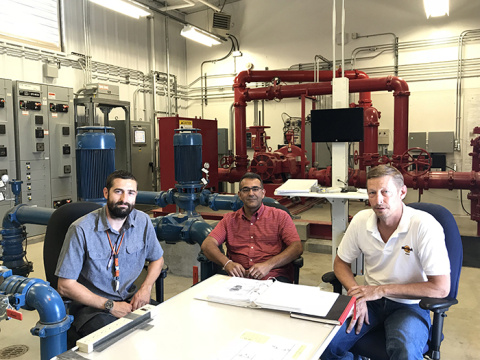 Members of the team that completed the water utility services operations transfer, from left: Mike Winkel of Mission Support Alliance, and Sanjay Sanan and Kirk Heaton of Pacific Northwest National Laboratory.