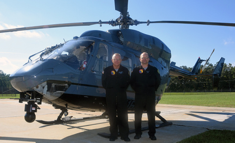 Butch Richister, left, and Brad Shealy, helicopter pilots with Savannah River Site security contractor Centerra-SRS, were recognized for quickly responding to a wildfire they observed during a routine security overflight on the site.