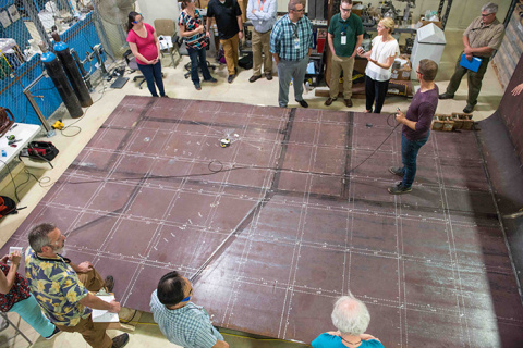A sensor traverses a 12-by-20-foot mock-up of a Hanford tank at the Pacific Northwest National Laboratory.