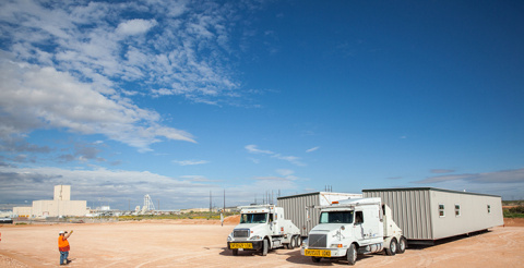 Construction trailers for a new ventilation system arrive at the Waste Isolation Pilot Plant earlier this fall. 
