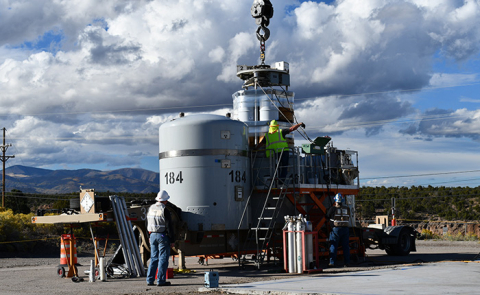 Newport News Nuclear BWXT-Los Alamos waste management staff prepare a waste shipment for transport to EM's Waste Isolation Pilot Plant.