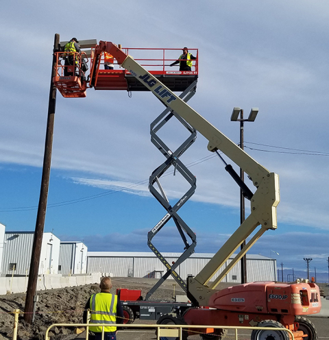 Workers replaced 400 light fixtures across 21 waste storage buildings and outdoor areas at Hanford’s Central Waste Complex, improving energy efficiency and visibility and reducing operating costs.