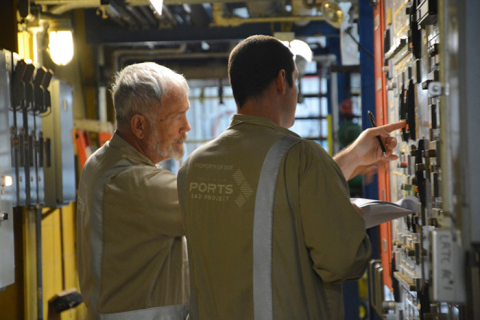 Fluor-BWXT Portsmouth supervisor Bill Bayless, left, and chemical operator Brent Copley monitor uranium hexafluoride transfer operations in support of the decontamination and decommissioning of the Portsmouth Gaseous Diffusion Plant in southern Ohio.