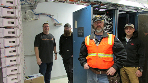 Robin Maples, Zack Larson, Joe Jensen, and Quinn Bragg with Mission Support Alliance were among the technicians who replaced access layer switches throughout the Hanford Site.