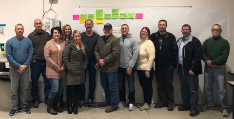 Mission Support Alliance employees gather together during a two-day workshop to improve worksite personnel relocations. They developed a plan to save more than $300,000 annually.