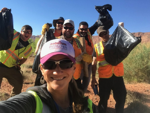 Moab Uranium Mill Tailings Remedial Action Project employees pick up trash at the Moab Site to mark Earth Day. They retrieved items by the Colorado River ranging from plastic foam to a vacuum cleaner.