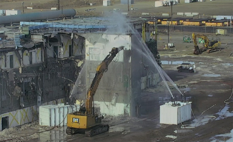 Workers demolish a stairwell attached to the Plutonium Finishing Plant’s Main Processing Facility late last month. 