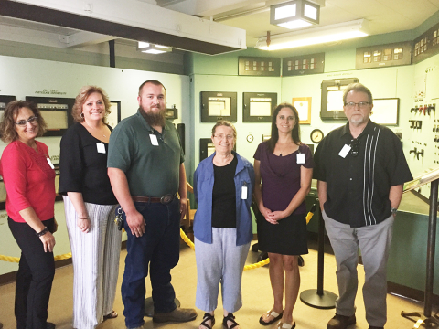 New Oak Ridge Site Specific Advisory Board members, from left, Georgette Samaras, Amy Jones, Noah Keebler, Harriett McCurdy, Andrea Browning, and Robert Whittaker visit the historic Graphite Reactor at Oak Ridge National Laboratory.