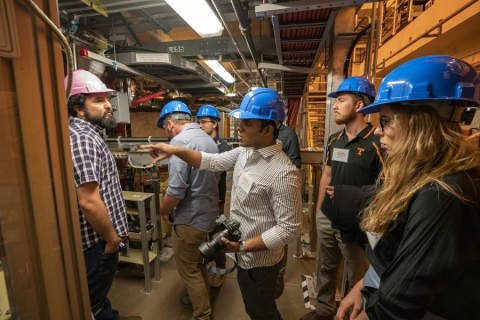 Arturo Dominguez, PPPL’s Science Education Senior Program Leader and one of the summer school’s organizers, leads a student tour. Arturo Dominguez, PPPL’s Science Education Senior Program Leader and one of the summer school’s organizers, leads a student tour.