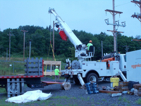 A crew installs electrical equipment at the West Valley Demonstration Project’s new switchgear station.