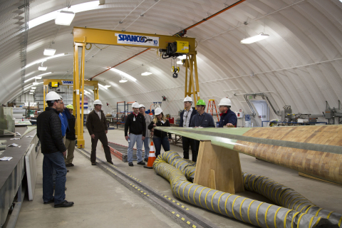 People standing in the National Wind Technology Center.