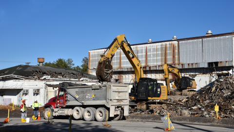 Oak Ridge crews remove debris from the K-1004-J Lab demolition, which began earlier this month.