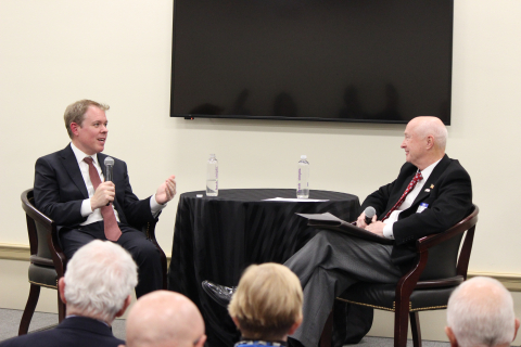 Ike White, left, head of the EM program, discusses EM’s cleanup progress with Pat Hopper, president of the Energy Technology and Environmental Business Association. Hopper moderated the event for the House Nuclear Cleanup Caucus.