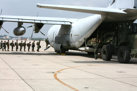 Marines board a KC-130 aircraft. Henry Mutka, a military veteran and engineer with the Oak Ridge Office of Environmental Management.