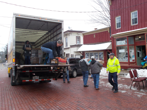 Volunteers in the West Valley Demonstration Project’s annual food drive deliver 44 turkeys and other items to a food pantry in Cattaraugus, New York.