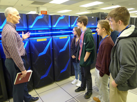 Mason Richardson, with the information technology division at Savannah River Nuclear Solutions, leads a tour of Evans High School students at the Savannah River Site Data Center.