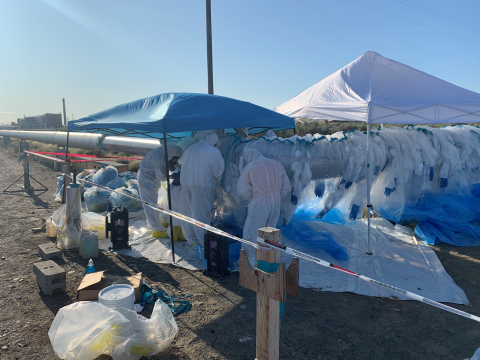 Crews recently removed asbestos-covered steam lines, at top, to allow construction of new access roads, above, to the Hanford Site’s Integrated Disposal Facility, to prepare for the eventual disposal of vitrified low-activity waste. 