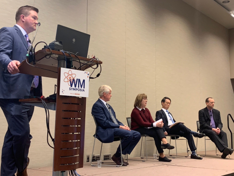 EM managers tackled a variety of questions from the audience and moderator Martin Schneider of Longenecker and Associates (standing) during the “Hot Topics” panel at the Waste Management Symposia. Seated from left are Savannah River Site Manager Mike Budn