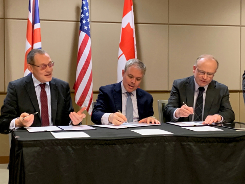 Ike White representing EM; and Alastair MacDonald of Atomic Energy of Canada Limited, took  part in a signing ceremony at the Waste Management Symposia 2020 in Phoenix.