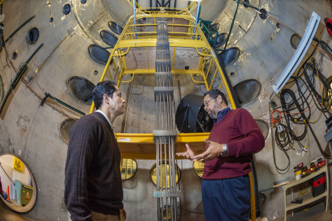 Efrain O’Neill, left, an electrical engineering professor at the University of Puerto Rico, Mayagüez, who is spending a year working at Sandia National Laboratories, talks energy research with Tito Bonano, a senior manager at the labs. Efrain O’Neill, left, an electrical engineering professor at the University of Puerto Rico, Mayagüez, who is spending a year working at Sandia National Laboratories, talks energy research with Tito Bonano, a senior manager at the labs.