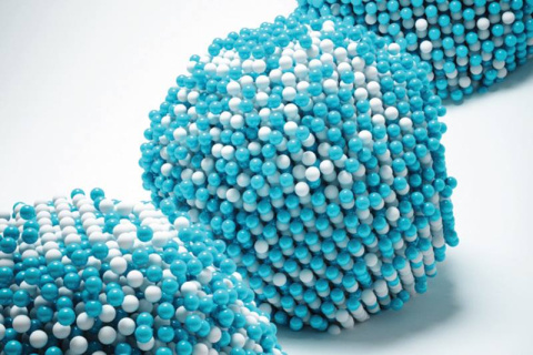 A schematic showing 4D atomic motion captured in an iron-platinum nanoparticle (iron in white, platinum in blue) after three different heat treatment times at 520 degrees C. 