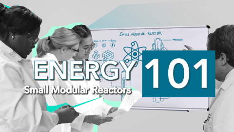 scientists around a white board with a diagram of a small modular reactor
