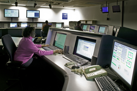 Janice Sandford, forefront, and other operators are shown in the Defense Waste Processing Facility control room. Savannah River Remediation recently upgraded its control system hardware and software. 