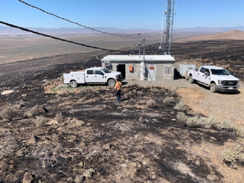 Kenny Ferguson, director of information technology infrastructure services for Richland Operations Office, inspects for potential damage to an unoccupied facility following the Gable Mountain fire, which burned more than 5,000 acres on the Hanford Site.