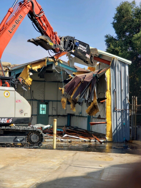 A crew tears down an instrumentation laboratory at the Radioactive Materials Handling Facility complex at the Energy Technology Engineering Center.