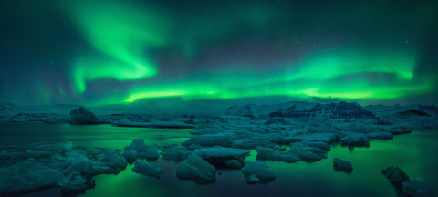 northern lights over arctic ice
