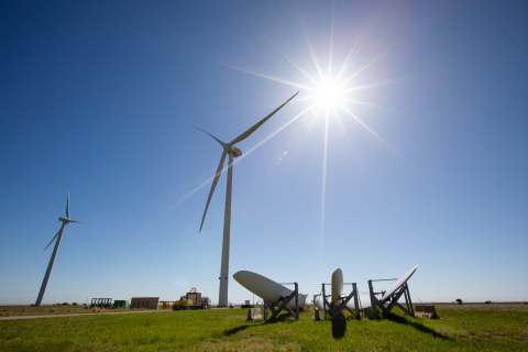 The 3-MW GE/Alstom research turbine (right) at the National Wind Technology Center (NWTC) stands fully intact during its final days, prior to it being dismantled after an 8-year research collaboration.