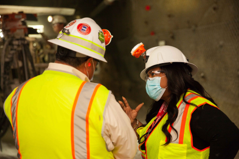 Principal Deputy Assistant Secretary for Field Operations Nicole Nelson-Jean talks to Carlsbad Field Office Deputy (CBFO) Manager Ed Garza during a tour of the underground at the Waste Isolation Pilot Plant (