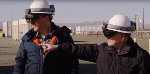 Doug Fenske, left, and Byron Gessel, team members with EM Richland Operations Office contractor Mission Support Alliance, demonstrate the use of location intelligence and mixed reality to locate underground utilities.
